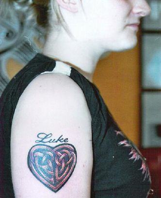 Celtic Heart Women's Arm Tattoo